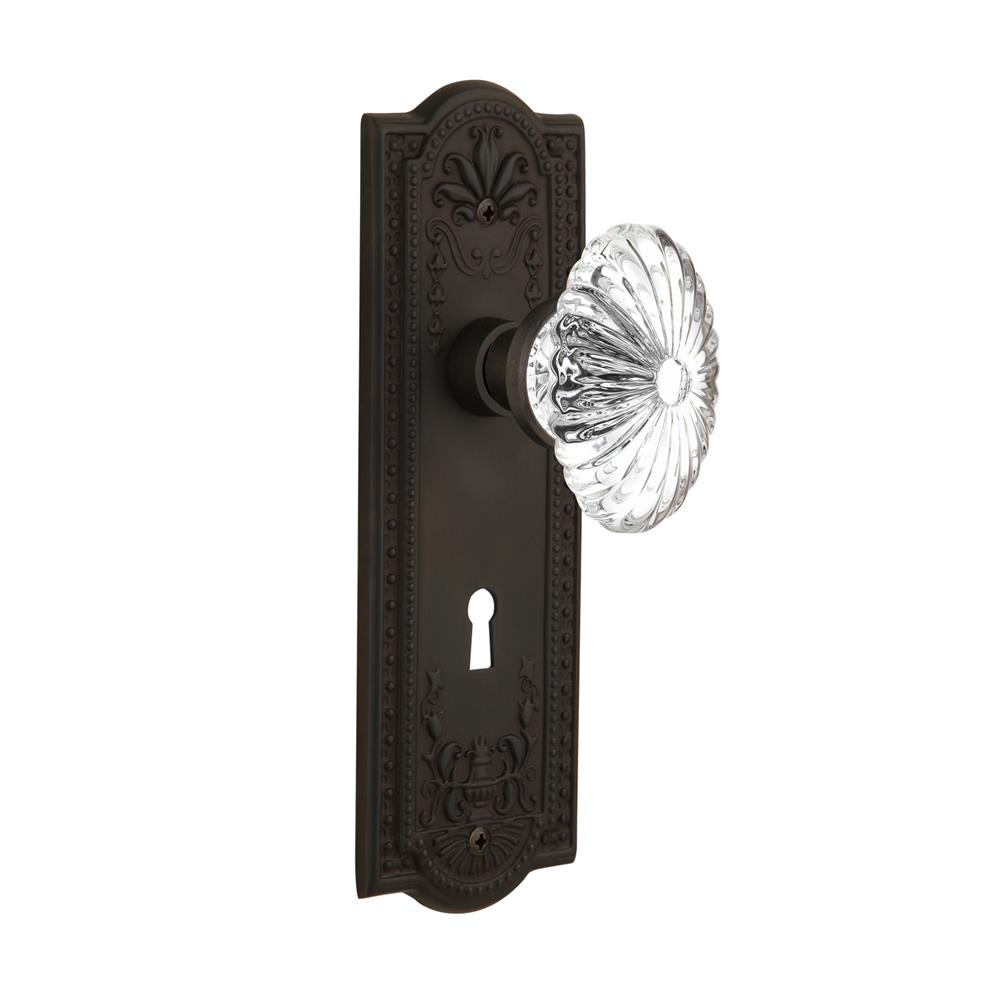 Nostalgic Warehouse MEAOFC Privacy Knob Meadows Plate with Oval Fluted Crystal Knob with Keyhole in Oil Rubbed Bronze